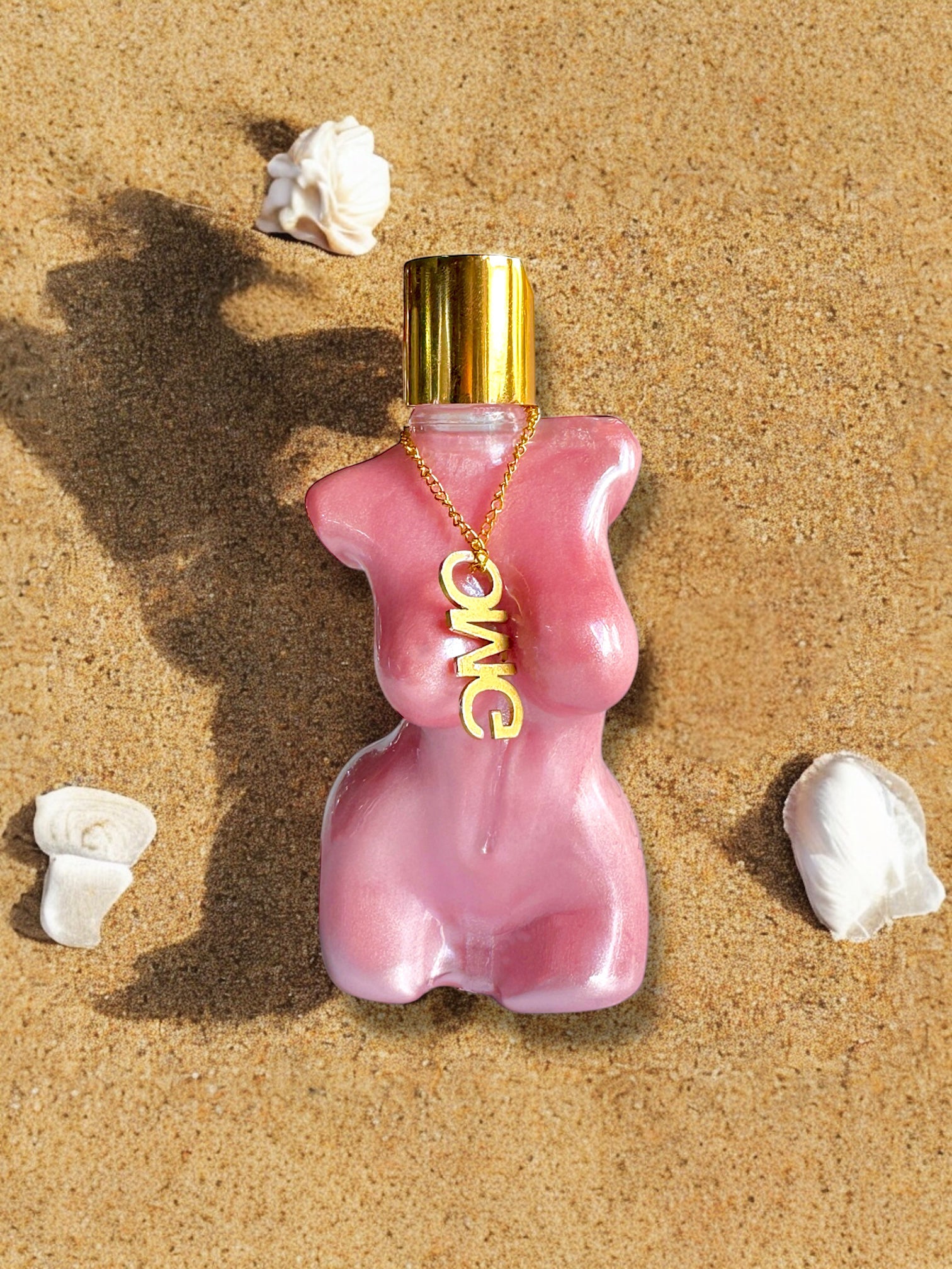 Pink bottle with gold cap and 'OWG' tannin oil