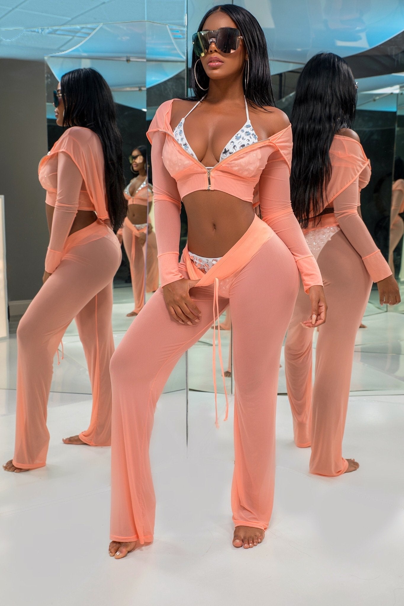 women wearing a The Island Ting Sheer Cover Up (Peach) - OMG Swim
