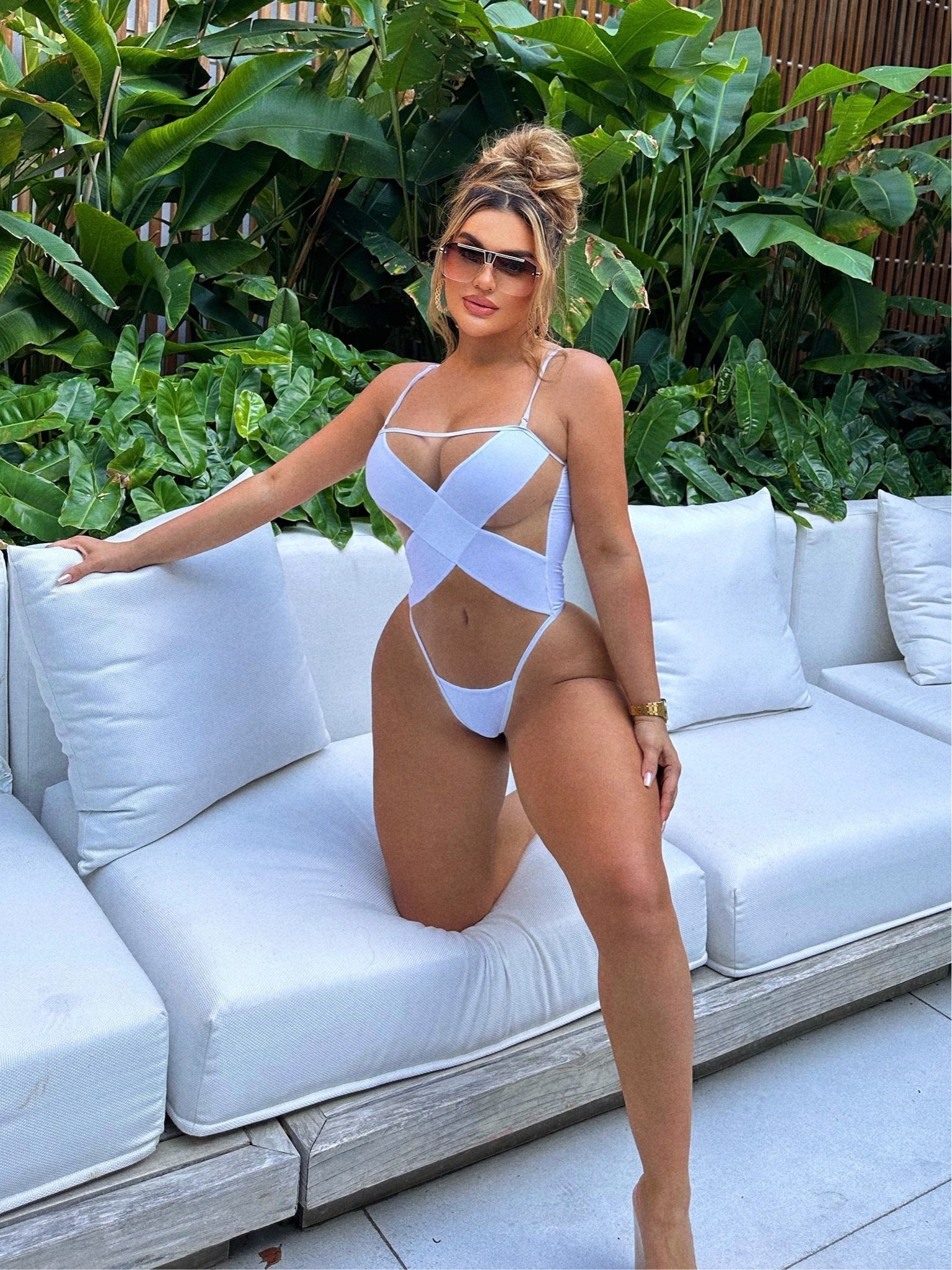girl wearing a one piece white Monokini  - OMG Swim