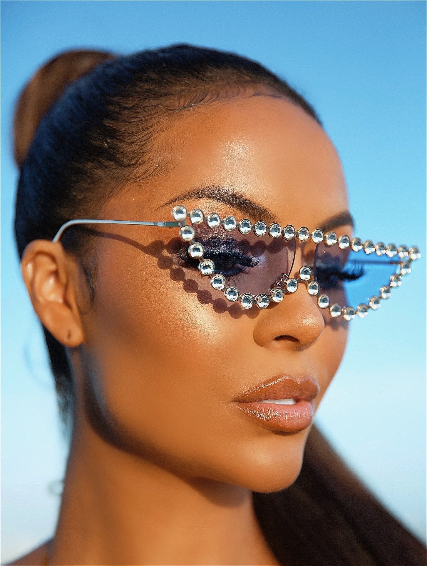 girl wearing a sparlky Shades - OMG Swim