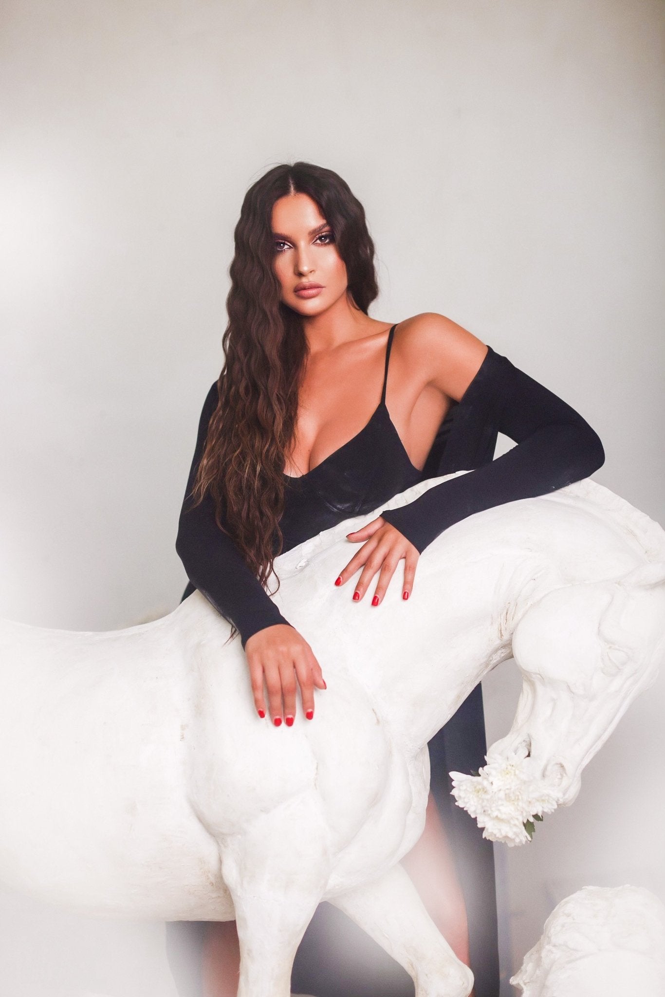 girl wearing black 2 piece Jumpsuit set- OMG Swim